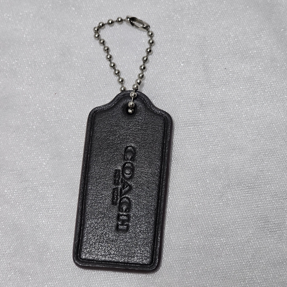 Coach black Tag